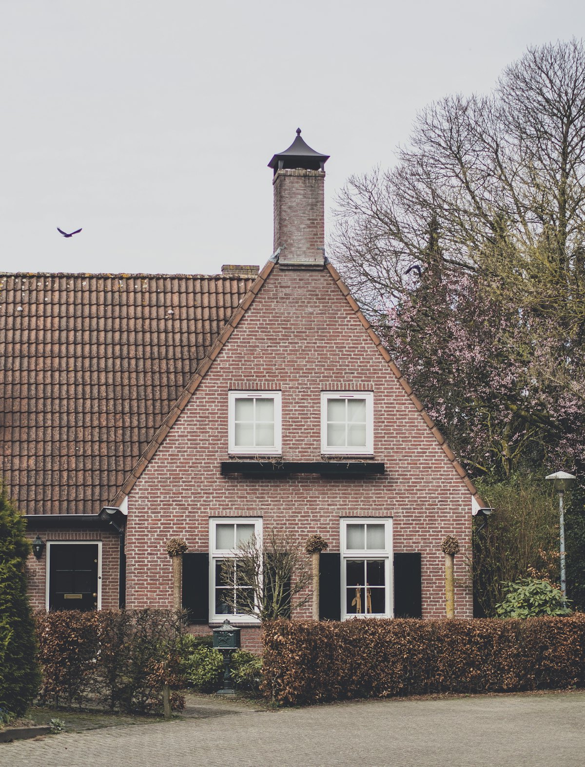 Woonhuis met schone ramen en gevel